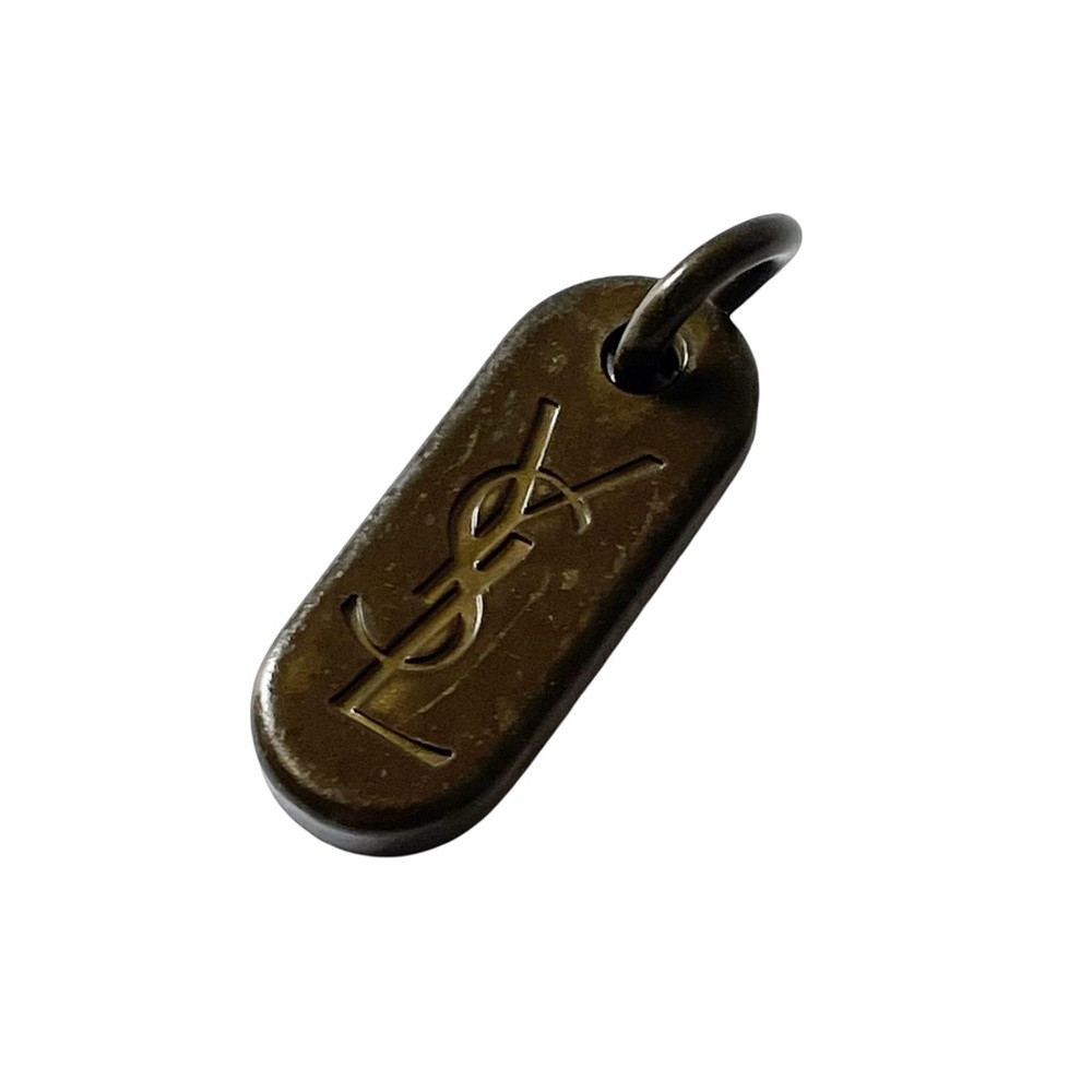 YSL engraved brass zipper pull charm